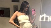 Pregnant Hailey Bieber Shows Off Baby Bump in Chic Cream Look as She Snaps Mirror Selfie: 'Working Hard'