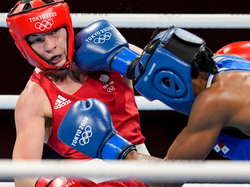Why do women wear headguards but not men in Olympic boxing?