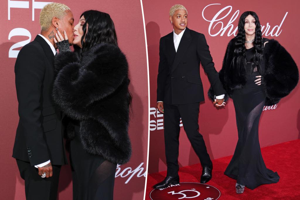 Cher and boyfriend Alexander ‘AE’ Edwards pack on PDA during amfAR Gala date night