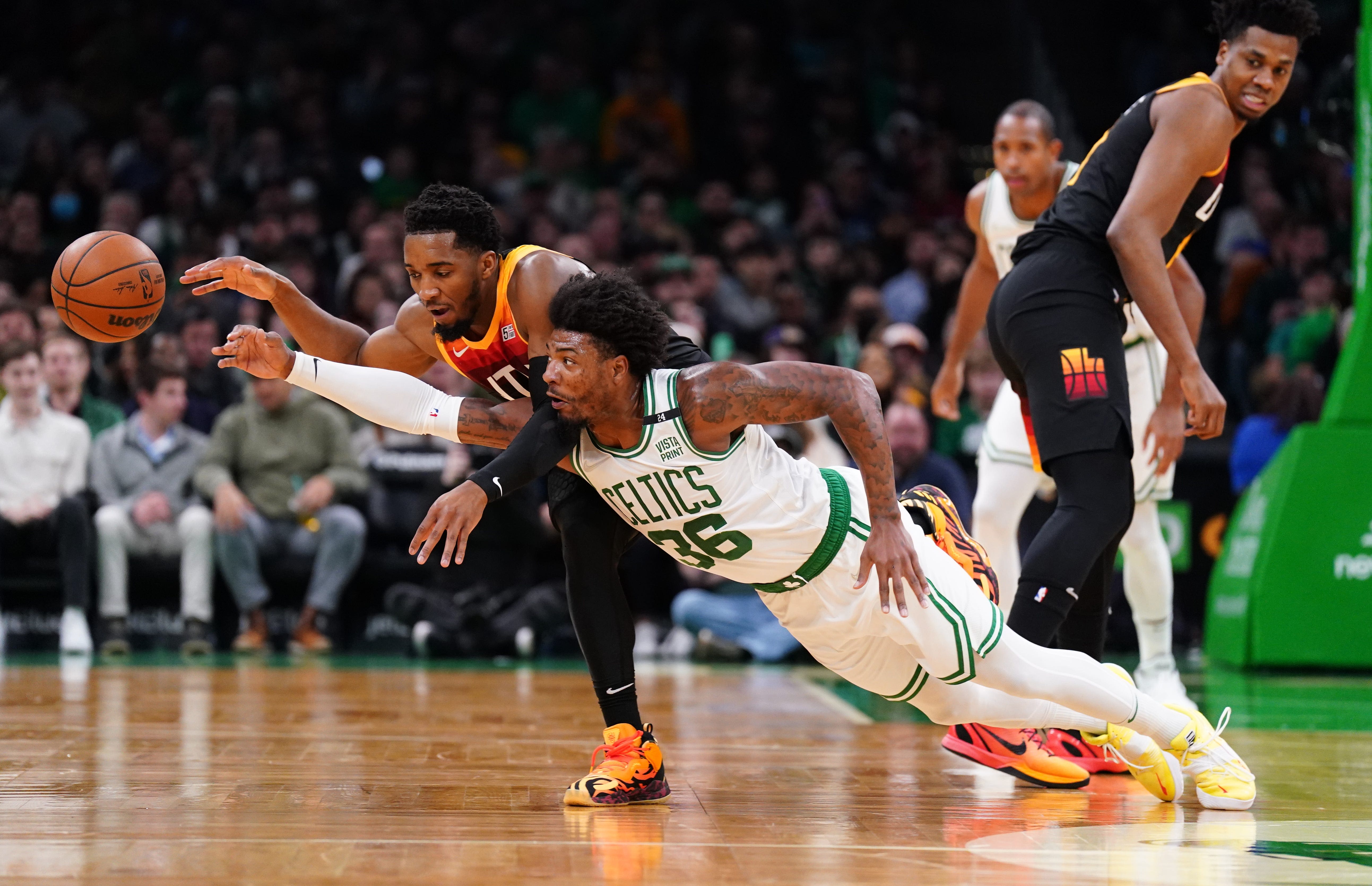 Watch Gary Payton Sr. inform Celtics' Marcus Smart that he is the 2022 Defensive Player of the Year