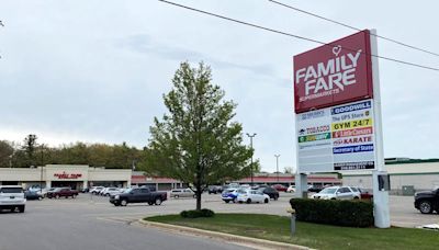 Woman found living in Michigan grocery store sign, complete with computer and Keurig, for months