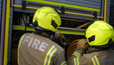 Around 100 firefighters tackle double house blaze in east London