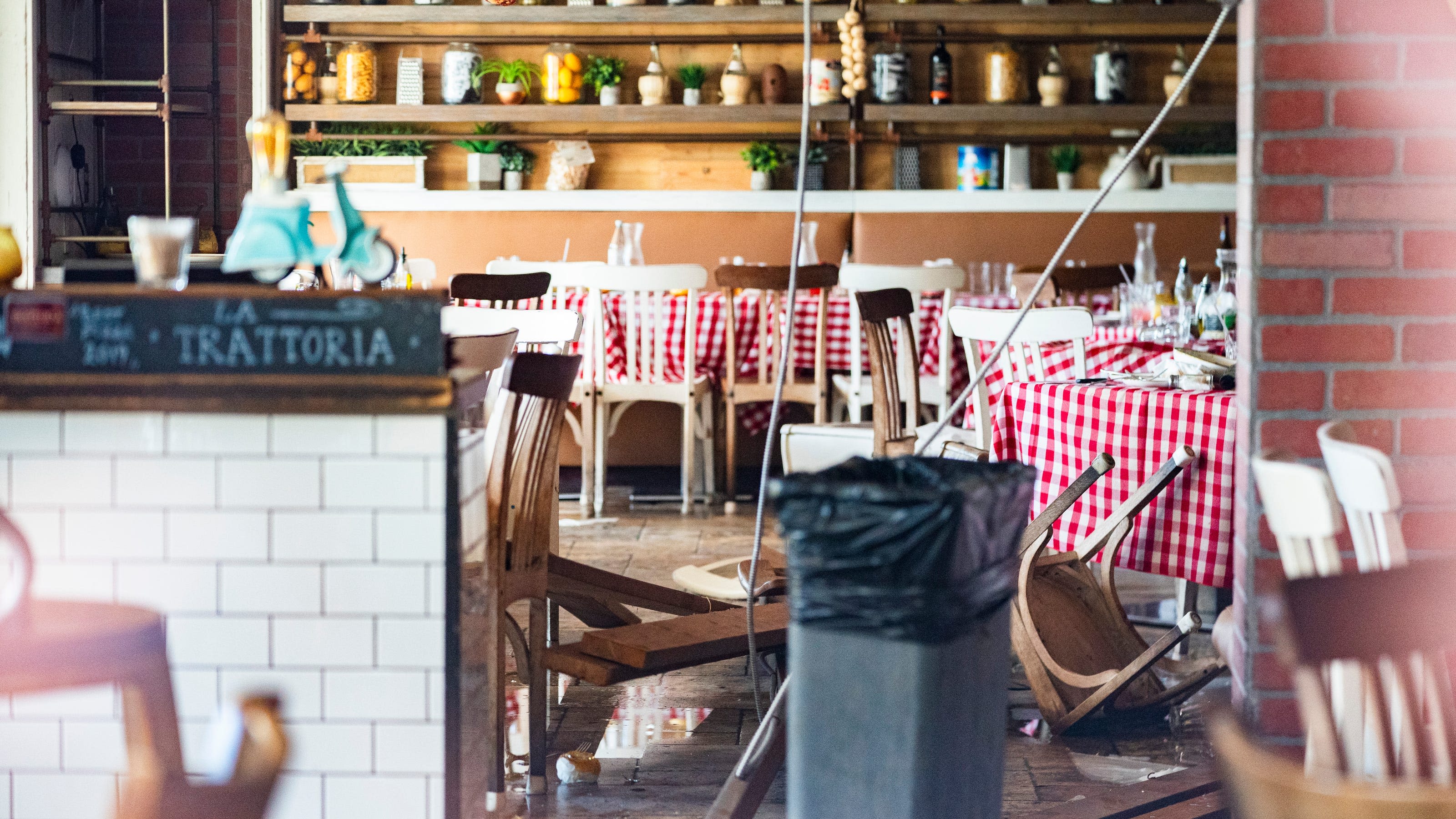 Photos show aftermath at La Trattoria restaurant in Naples after ceiling collapse