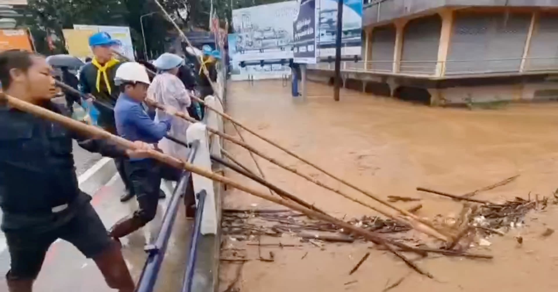 At least two dead, hundreds stranded in Thailand as floods hit north