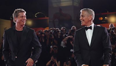 Brad Pitt and George Clooney Dance to 4-Minute Standing Ovation for ‘Wolfs’ During Chaotic Venice Premiere