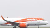 2 travelers in wheelchairs watched their plane depart without them as they waited on the tarmac