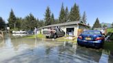 Residents in Alaska capital clean up swamped homes after an ice dam burst and unleashed a flood