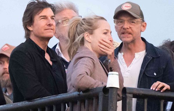 Tom Cruise Attends Coldplay’s Glastonbury Festival Set with Gillian Anderson and Simon Pegg