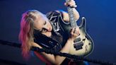 Nita Strauss steps in the ring and delivers a knockout guitar solo in heavyweight new single Victorious