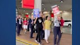 American Airlines flight attendants hit the picket lines