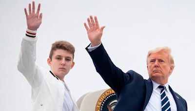 Donald Trump's 6'7 son Barron, 18, towers over Secret Service detail as he embarks on new chapter