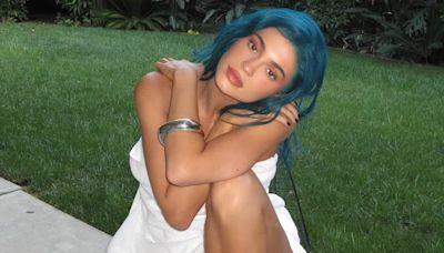 Kylie Jenner almost spills out of her towel