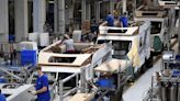 Euro zone factory activity contracted in July as recession fears grow