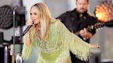 Carrie Underwood makes a splash during 'massive downpour.' But did she fall?