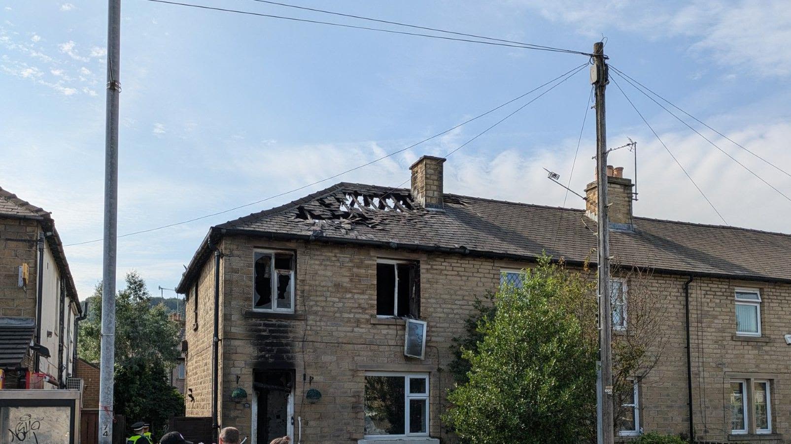 Woman dies and two girls critical after house fire