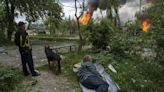 Thousands flee as Russia presses border assault near Ukraine’s 2nd-largest city