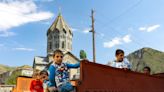 Half of Nagorno-Karabakh's population flees as the separatist government says it will dissolve