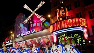 Moulin Rouge restores windmills after collapse