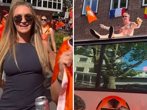 Laura Woods photobombed by 'naked' man on bus as she hangs out with Holland fans