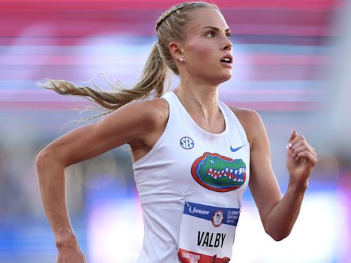 Why Is Parker Valby Still Racing in Her College Uniform?