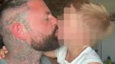 Furious dad hits back after being trolled for kissing son, five, on the lips