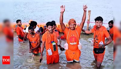 Kanwariyas reach Sangam for Gangajal | Allahabad News - Times of India