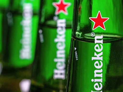 Heineken raises full-year profit guidance despite net loss in first half