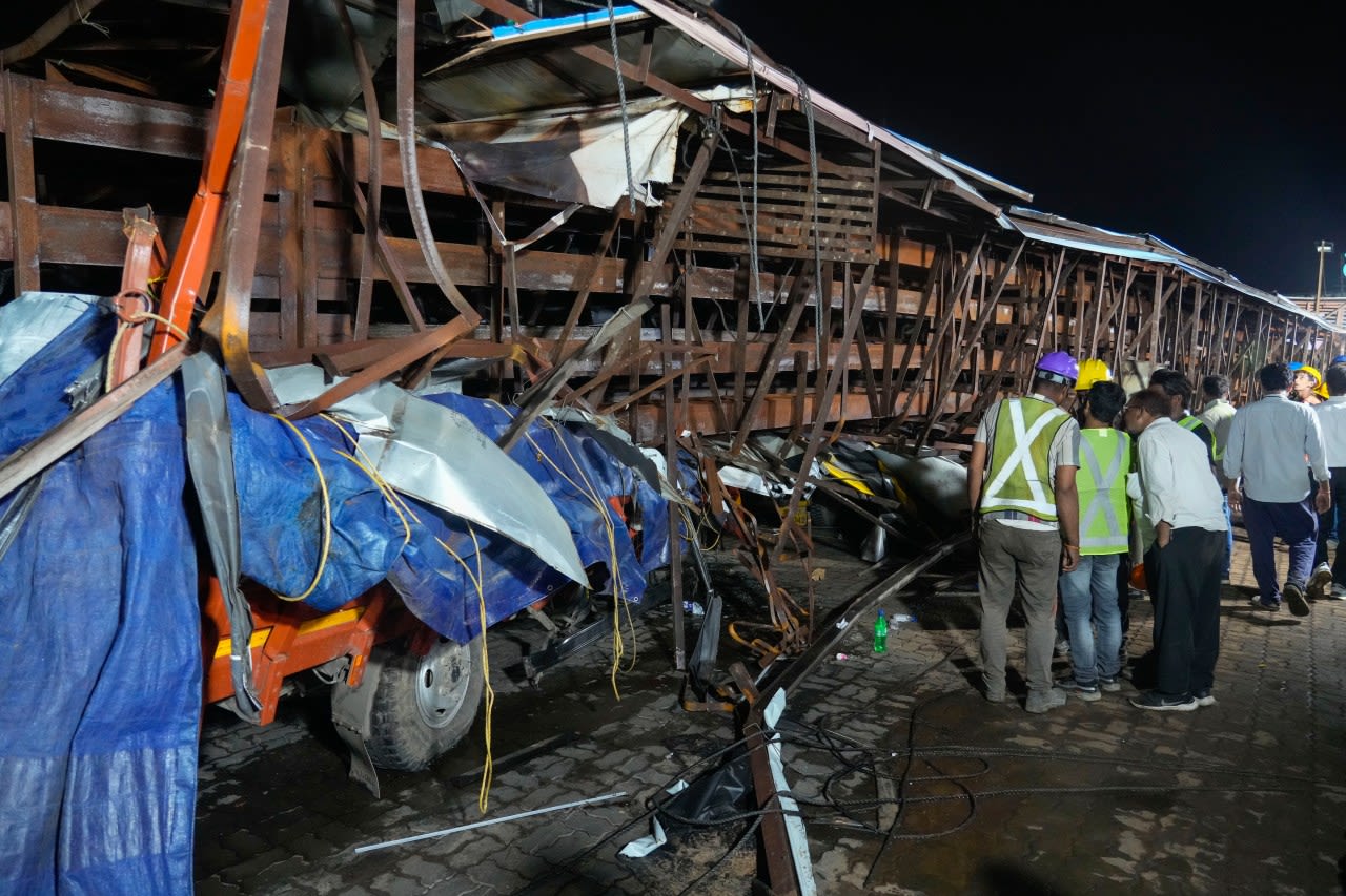 Billboard collapses onto people in Mumbai, India, killing at least 14 but others may be trapped