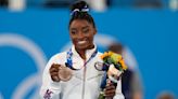 Gymnastics star Simone Biles returning to competition in August in first meet since 2020 Olympics