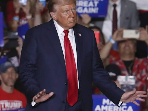 Donald Trump escalates attacks on Harris' mental fitness and suggests she should be prosecuted