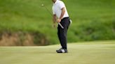 Schauffele sets another major scoring record, sets PGA pace