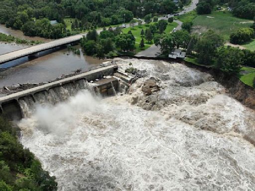 At least 2 are dead from catastrophic Midwest flooding and a Minnesota dam is at risk of failing