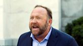Alex Jones shakes his head as Sandy Hook shooting lies read out in court