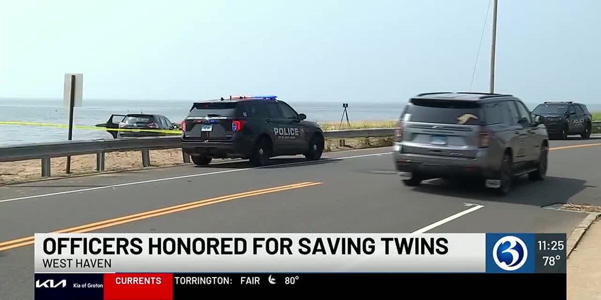 West Haven police officers who saved twins from drowning honored at ceremony