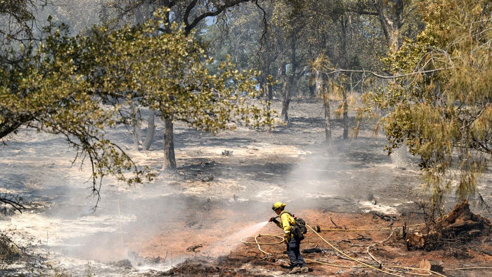 A ‘potentially historic’ heat wave intensifies along the West Coast, as dangerous wildfires spread