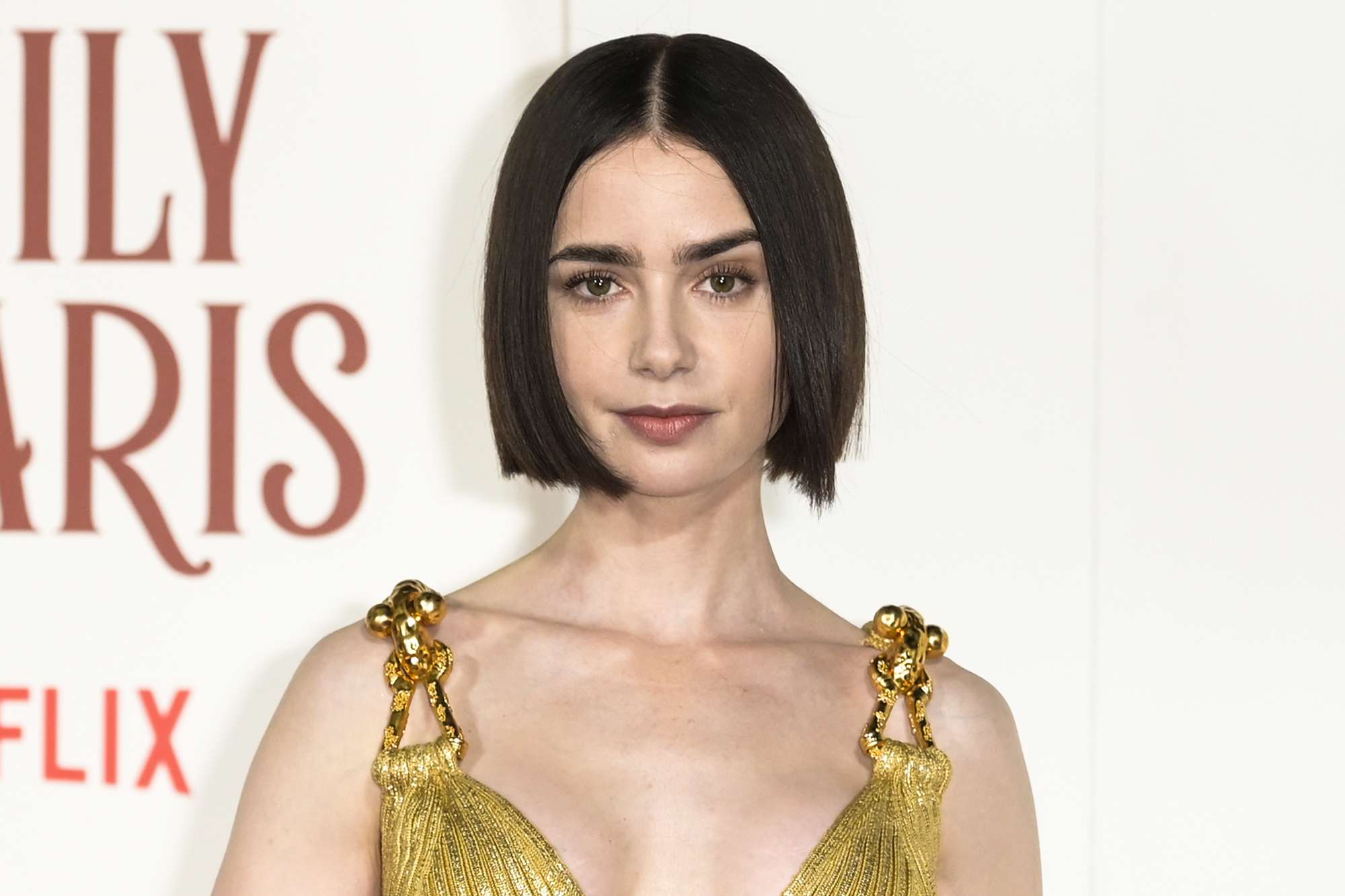 Lily Collins Evokes 'Bold Roman Statue' Look for “Emily in Paris” Season 4 Part 2 Premiere in Rome (Exclusive)