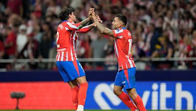 Angel Correa's late strike helps Atletico earn draw vs Real Madrid in fiery derby marred by fan trouble