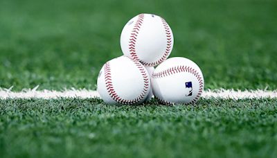 St. Norbert professor, 'Jeopardy!' competitor throws first pitch at Milwaukee Brewers game