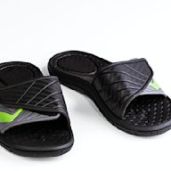 Open-toe sandals with a wide strap that goes over the top of the foot Easy to slip on and off Often worn for casual activities and around the house