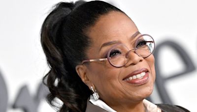 Oprah Winfrey, 70, makes a statement in glimmering suit and galactic flats