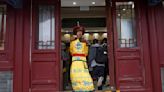 AP PHOTOS: Glimpses of Beijing through windows and doorways