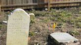 What happened when a graveyard was found on the site for a new Sussex County bank