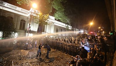 Police use tear gas, water cannons and stun grenades on 'foreign agent' bill protesters in Georgia's capital