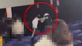 Shock moment pro boxer pummels cinema-goer 'who had hit his wife'