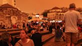 Photos: Athens turns orange under North Africa’s Sahara dust clouds