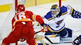 Joel Hofer makes 27 saves in 1st career shutout as Blues blank Flames 3-0