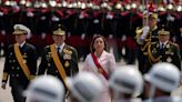 New Peru president appears with military to cement power