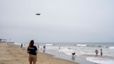 Sharks are congregating at a California beach. AI is trying to keep swimmers safe