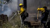 Firefighters make progress against massive blaze in California ahead of warming weather
