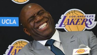 Magic Johnson got 30 times richer after his playing days in the NBA — here's how the billionaire did it